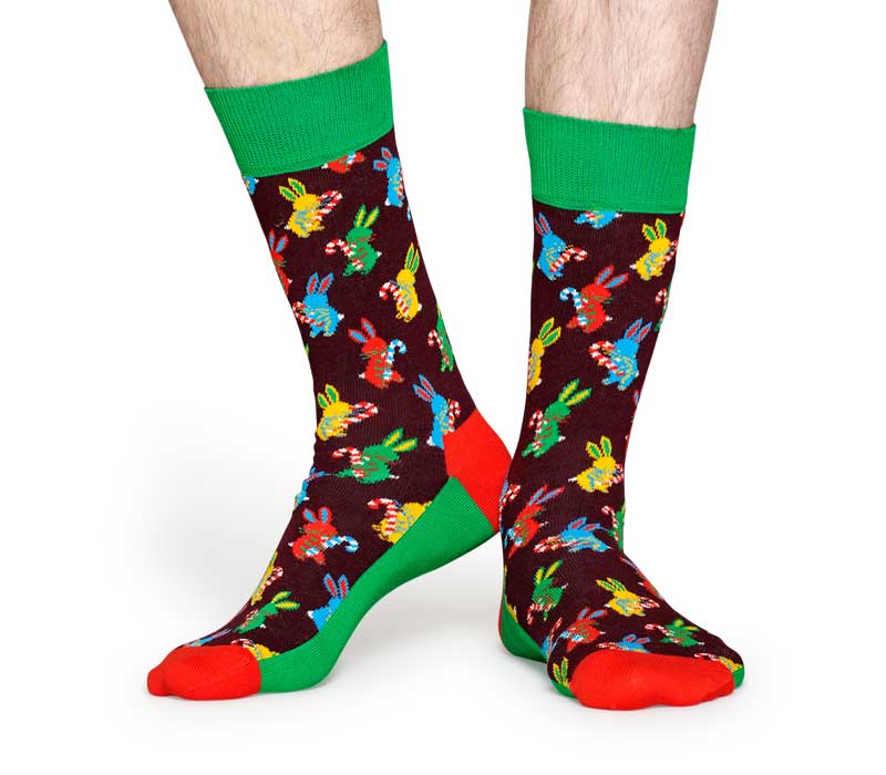 Macaulay Culkin feliz con sus calcetines Happy Socks