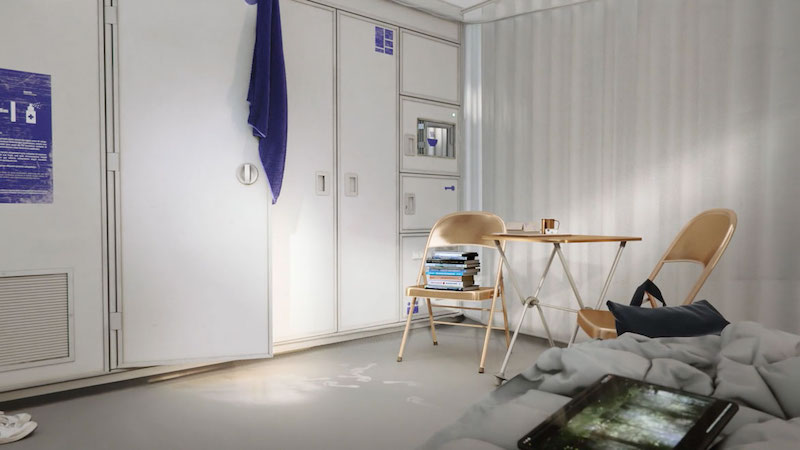 La Casa Encendida con DIS.ART, fotograma de un interior blanco con sillas y una cama