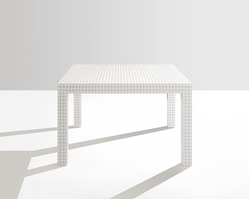 Cassina compra Zanotta: una mesa blanca con una cuadrícula dibujada en negro