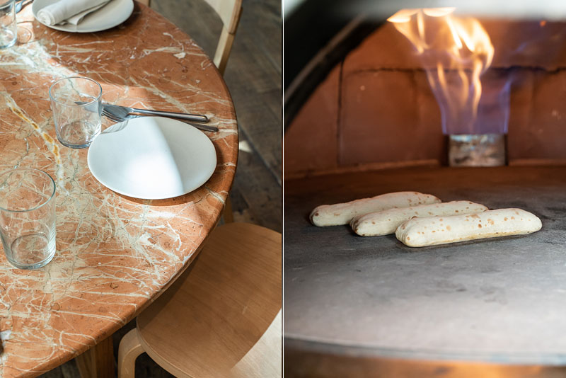 Restaurante Her: Detalle de mesa y panes en el horno de leña