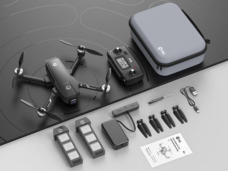 Mejores drones: el dron Holy Stone HS720E EIS 4K con todos sus accesorios.