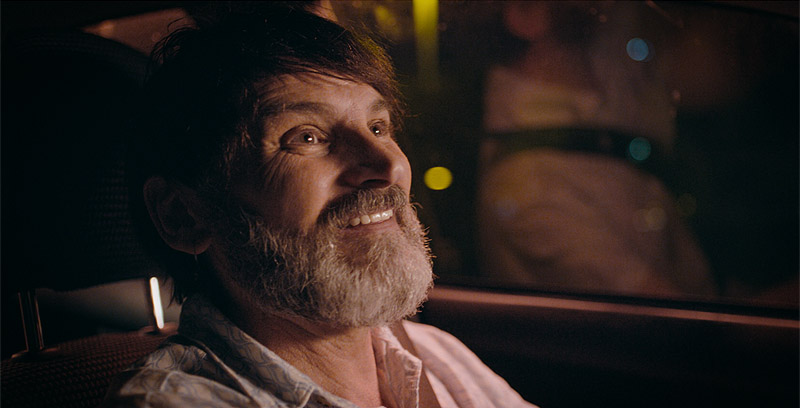 Historias de Paco Sepulveda. Fotograma de la película, primer plano de hombre sonriendo