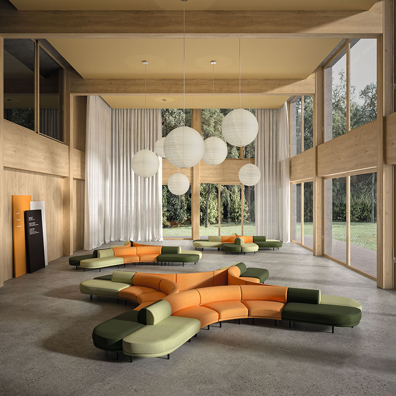 Andreu World novedades Milan Design Week 2024: un conjunto de sofás en el lobby de una gran oficina
