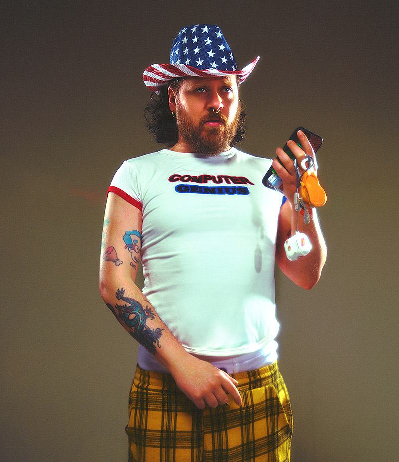 Junior Healy - fotografía de estudio disfrazado con un gorro de vaquero con la bandera de eeuu