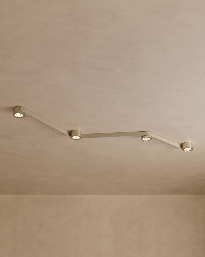 Detalle del techo con módulos de luz MAP de Geckeler Michels para Lodes conectados por cinta tensada en disposición quebrada