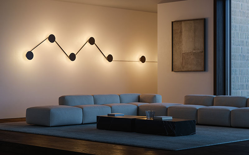 Composición mural con módulos de luz indirecta del sistema MAP de Geckeler Michels para Lodes instalada sobre pared blanca