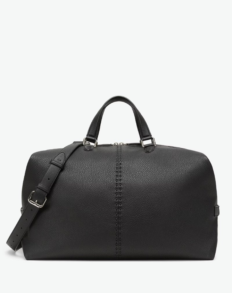 Tendencias de moda masculina otoño 2025: maxibolsos