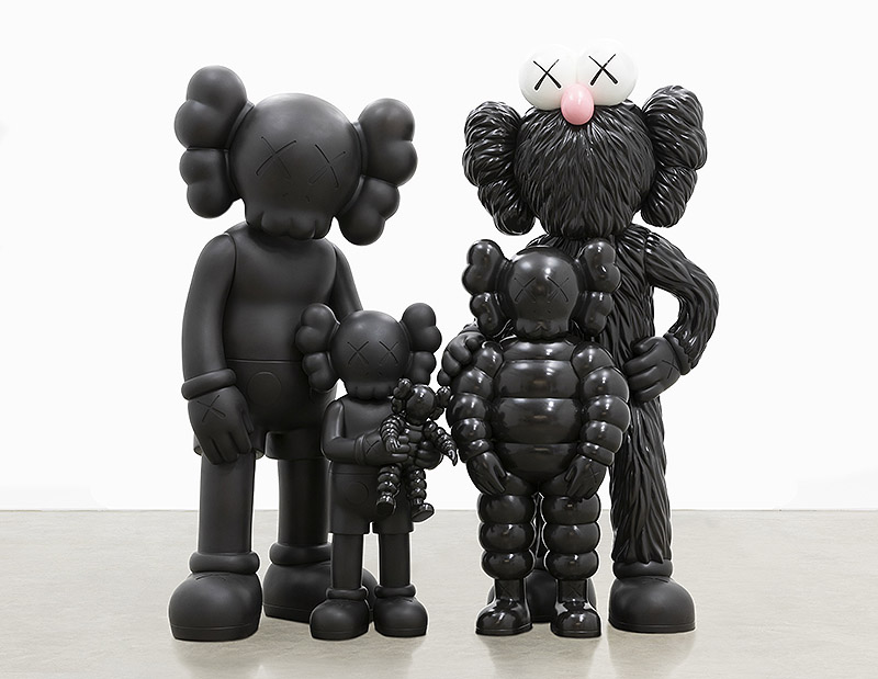 Kaws - figuras clásicas del artista con cabeza de calavera y pelo de payaso