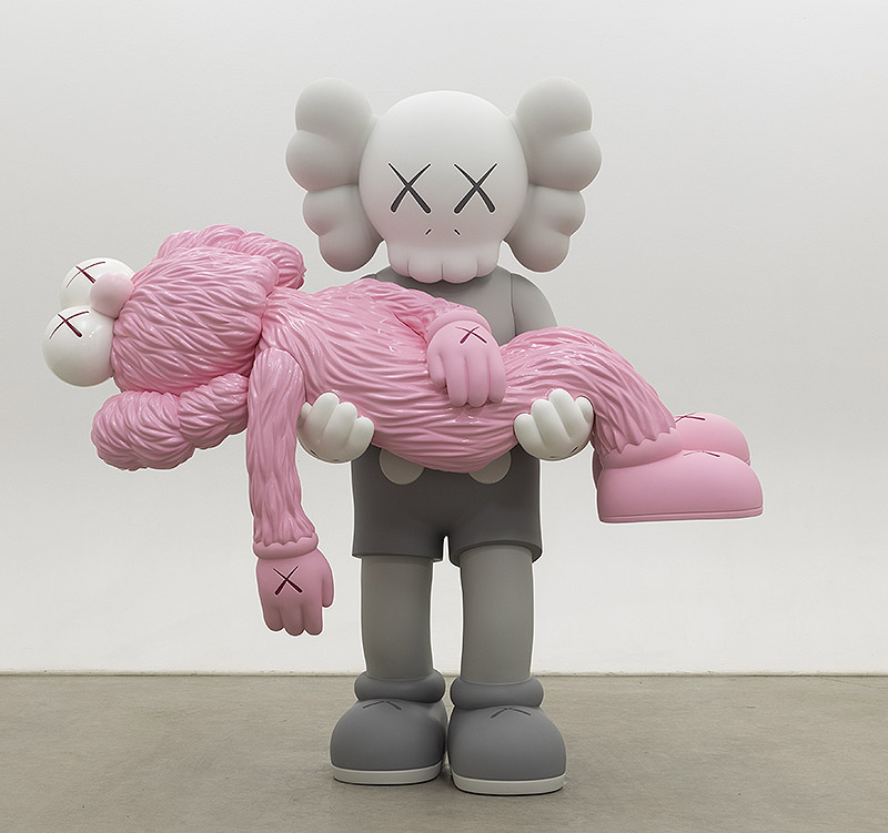 Kaws - figuras clásicas del artista con cabeza de calavera y pelo de payaso