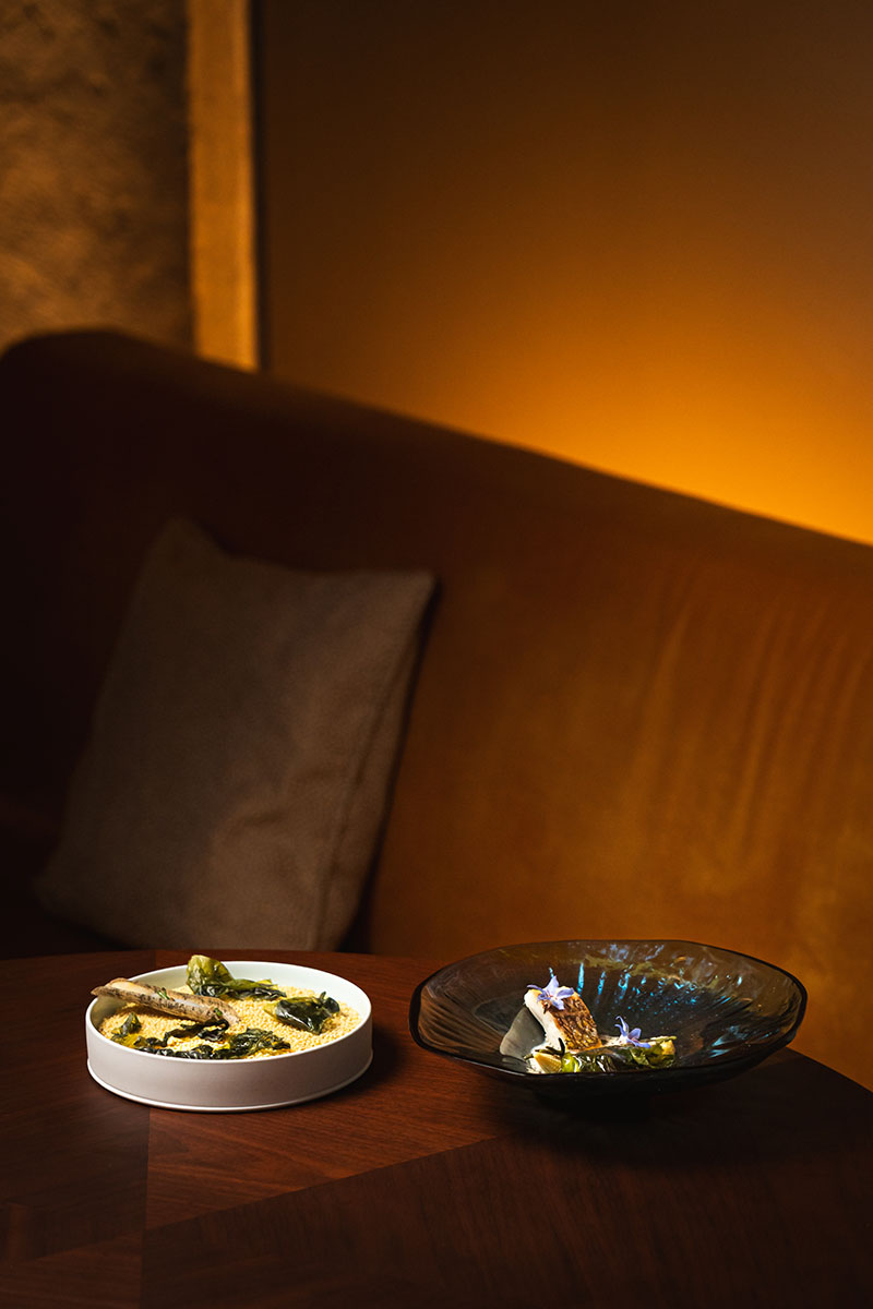 Dos platos del Restaurante Suba en Lisboa presentados sobre una mesa