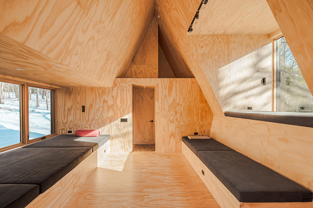 La cabaña de madera de BE_Design para retiros de bienestar