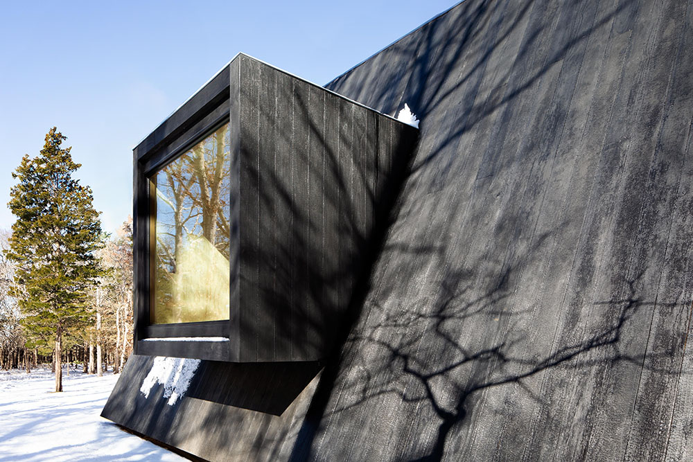 La cabaña de madera de BE_Design para retiros de bienestar